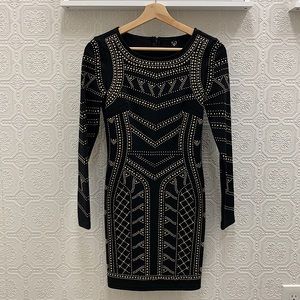 Stunning black cocktail dress with gold studs!
